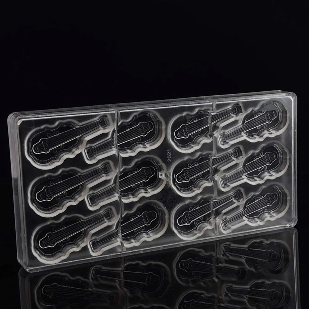 19286 / Moldes de policarbonato para chocolate con forma de violín